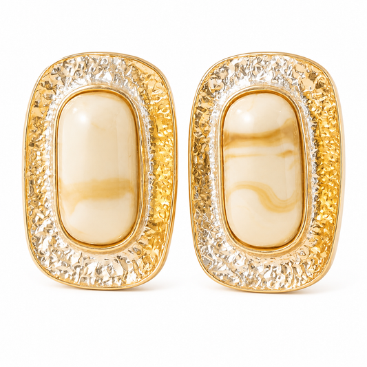 18K gold plated oval stud earrings featuring marbled resin centers framed by a textured hammered gold design on a clean white background.